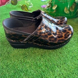 Dansko Leopard Patent Leather Clogs